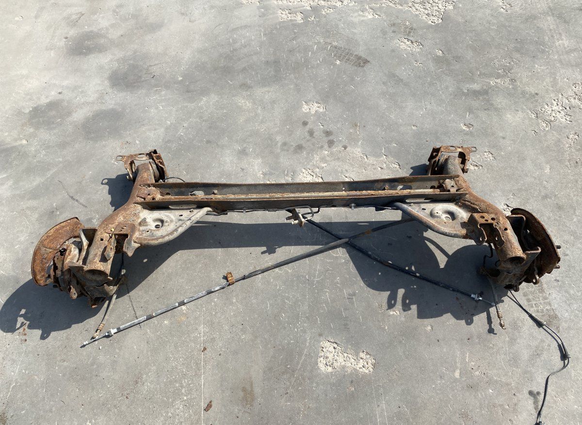 555011KK0A Rear axle Beam NISSAN JUKE I (F15) (2010-2019)