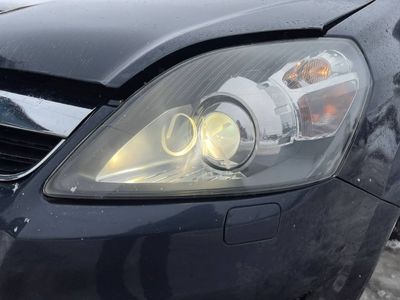 Headlight left OPEL ZAFIRA B (A05) (2005-2014)