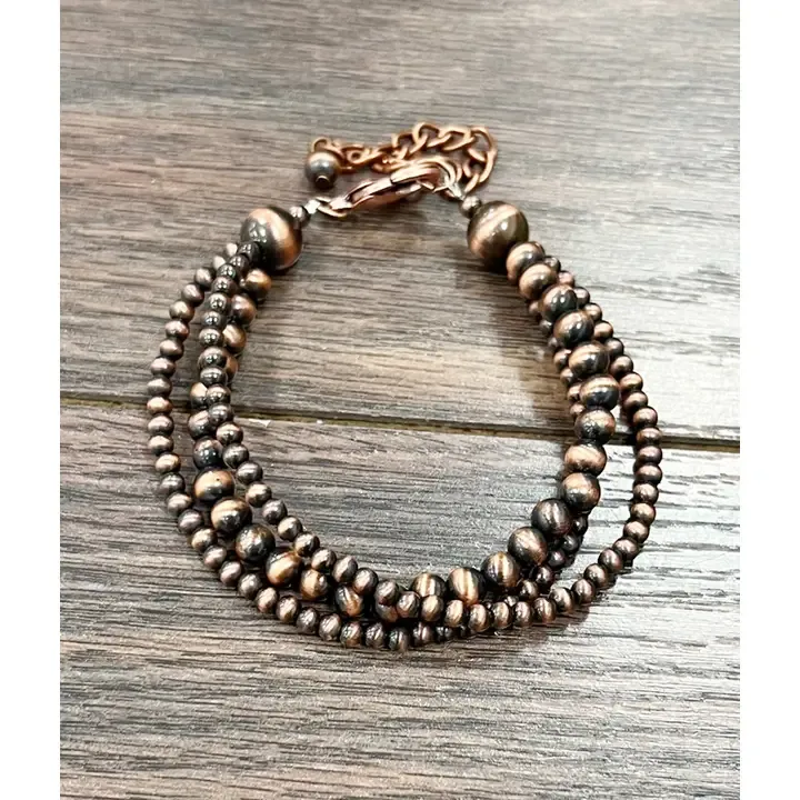ISAC TRADING INC. COPPER NAVAJO BEAD ADJUSTABLE BRACELET