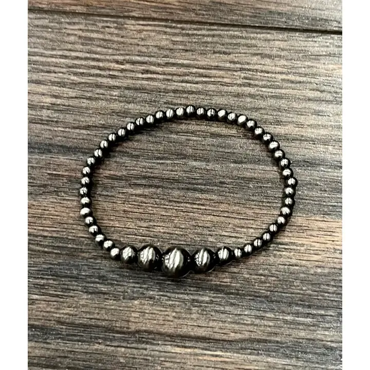 ISAC TRADING INC. POLISH NAVAJO BEAD STRETCH BRACELET