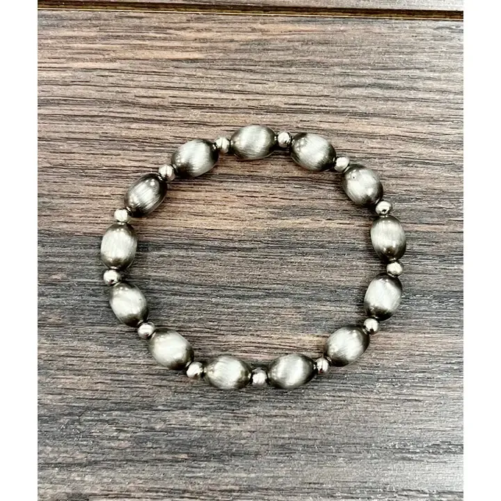 ISAC TRADING INC. 10MM NAVAJO BEAD STRETCH BRACELET - OVAL
