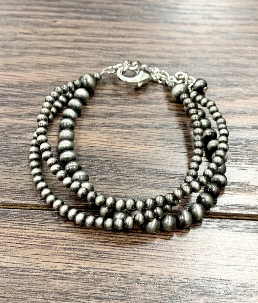 ISAC TRADING INC. WOMEN'S WESTERN BEAD STRAND ADJUSTABLE STRAND BRACELET