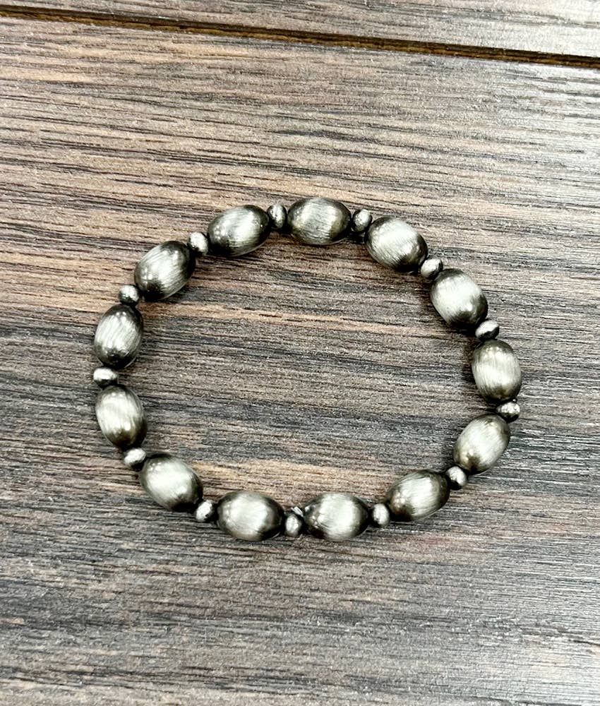 ISAC TRADING INC. WOMEN'S 10MM OVAL BEAD STRETCH BRACELET