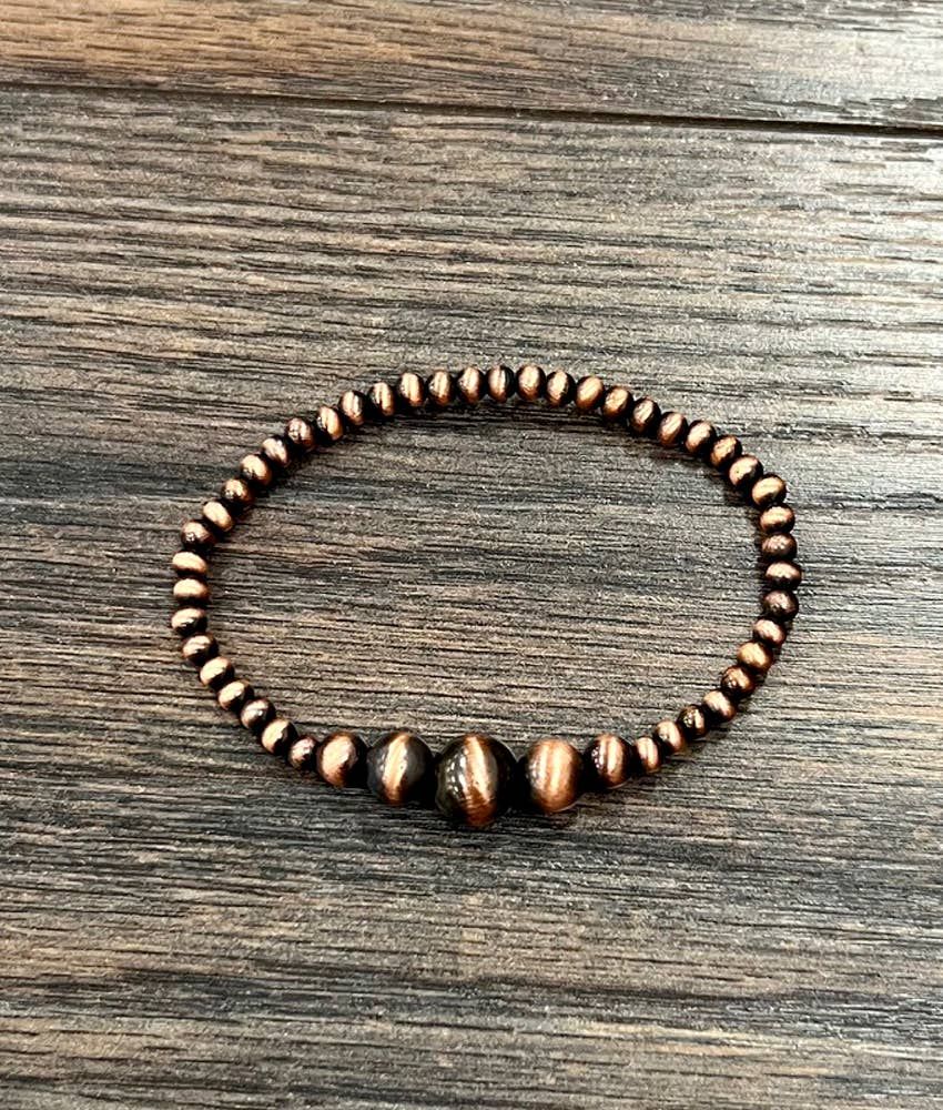 ISAC TRADING INC. WOMEN'S COPPER WESTERN BEAD STRETCH BRACELET