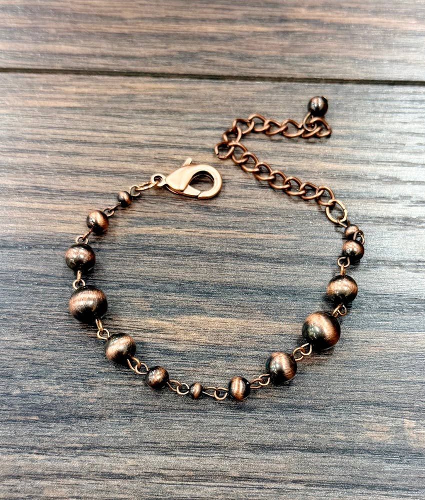 ISAC TRADING INC. WOMEN'S HANDMADE COPPER NAVAJO ADJUSTABLE BRACELET