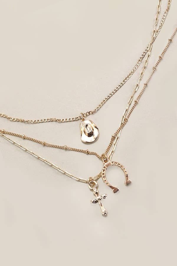 JOSSLYN BY WALL TO WALL  TRIO LAYER HORSESHOE HAT CROSS CAHRM NECKLACE, COLOR: GOLD