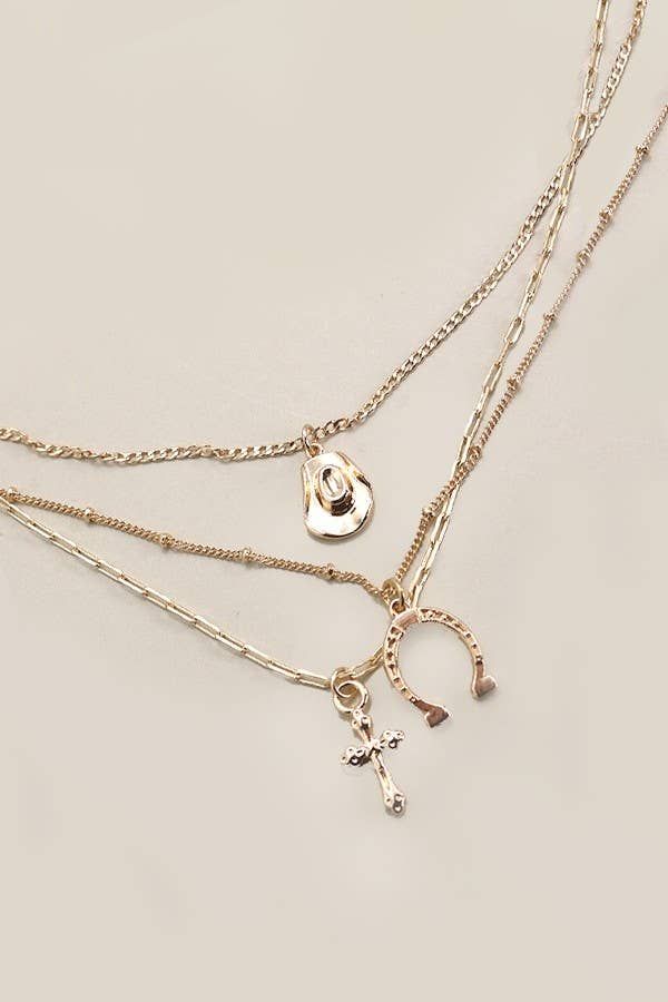 JOSSLYN BY WALL TO WALL TRIO LAYER HORSESHOE HAT CROSS CAHRM NECKLACE, COLOR: GOLD