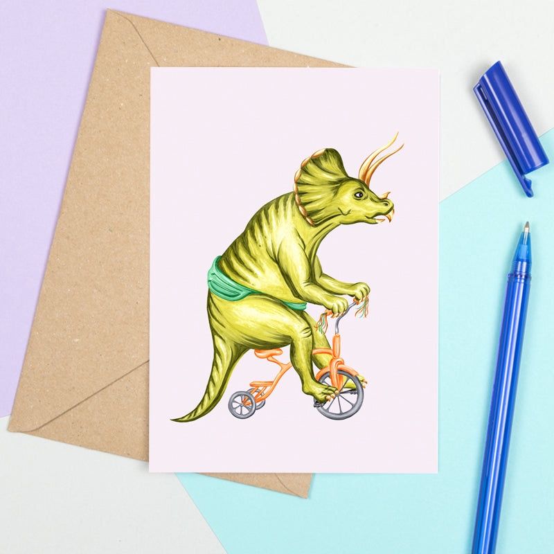 Triceratops en tricycle - Carte de souhait