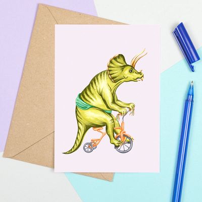 Triceratops en tricycle - Carte de souhait