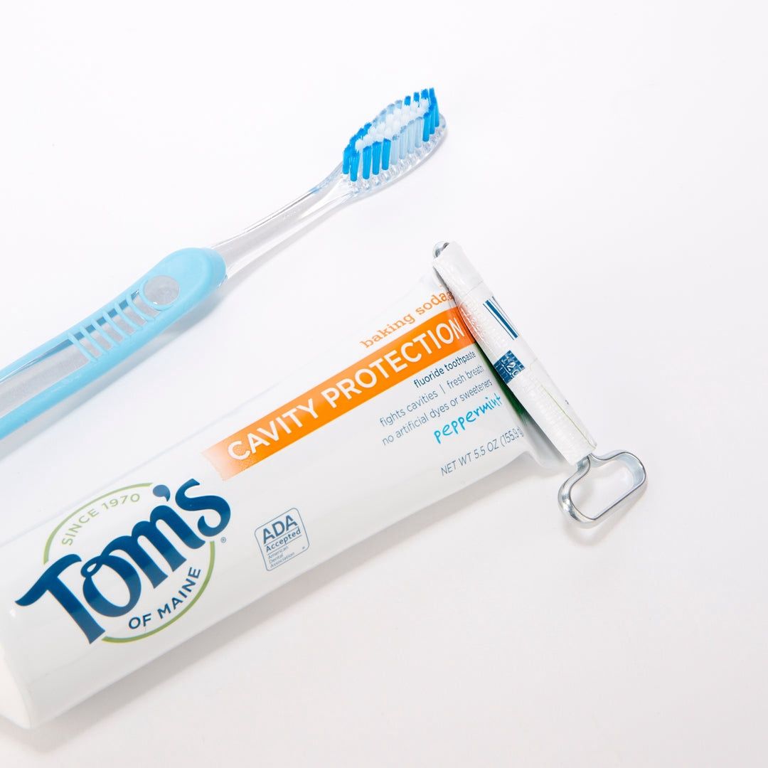 Clés à pression pour tube dentifrice