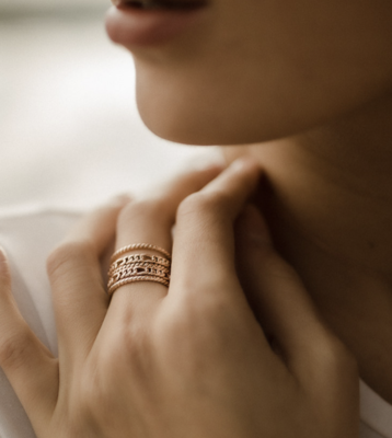 Anello treccia in oro rosa 9 kt