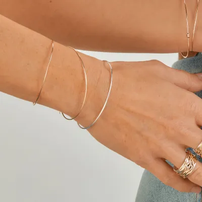 BRACCIALE CUPIDO IN ORO ROSA 9KT CON CATENELLA