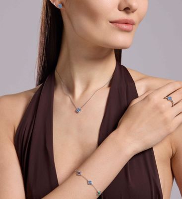 Anello Fiore zirconi azzurri