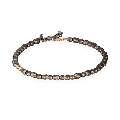BRACCIALE UOMO CON SASSI PICCOLI IN TITANIO E UN SASSO IN ORO ROSSO 9 KT BRACCIALE UOMO CON SASSI PICCOLI IN TITANIO E UN SASSO IN ORO ROSSO 9 KT