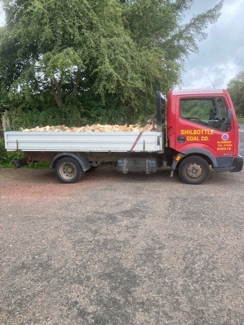 Truck filled with Hardwood Logs