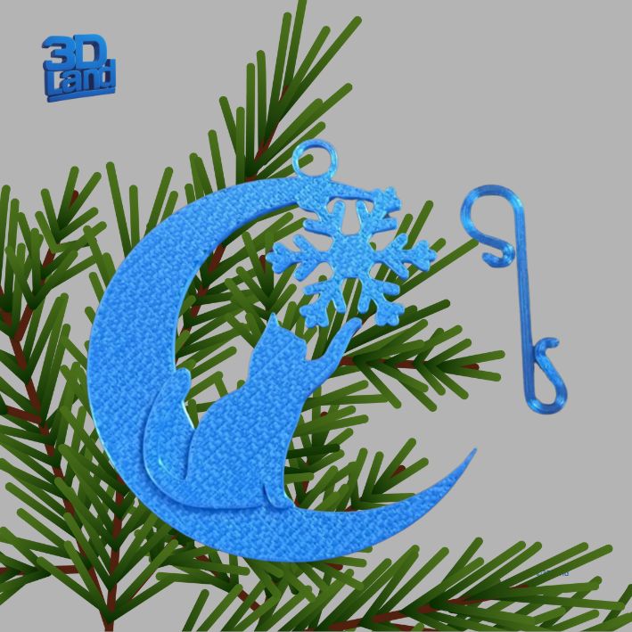 Kotek sięgający łapką śnieżynki Kotek sięgający łapką śnieżynki