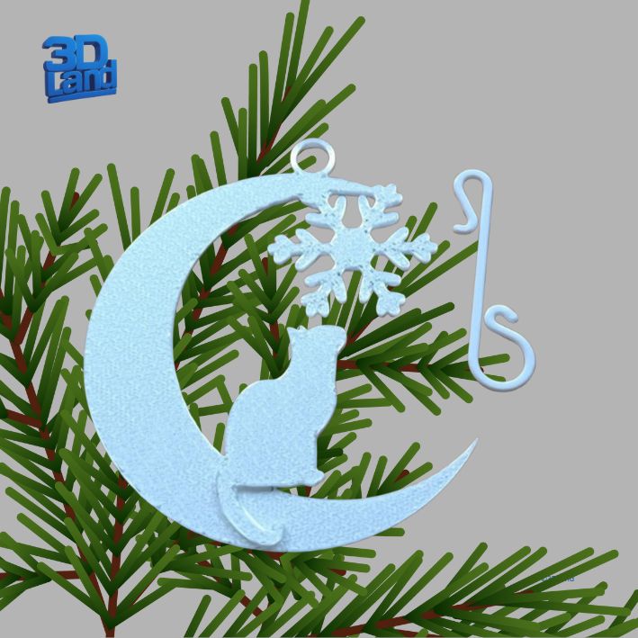 Kotek wpatrzony w śnieżynkę Kotek wpatrzony w śnieżynkę