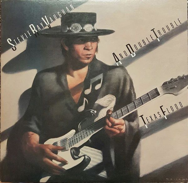 STEVIE RAY VAUGHAN - TEXAS FLOOD - (VINYL LP RECORD)