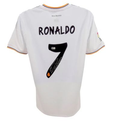Camiseta del Real Madrid firmada por Cristiano Ronaldo (Cr7) 2013-2014. Camiseta firmada por Ronaldo (Cr7) 2013-2014.  Réplica de la camiseta del Real Madrid firmada por Cristiano Ronaldo (Cr7) 2013-2014.  Autenticación: Holograma Beckett.  Plazo de