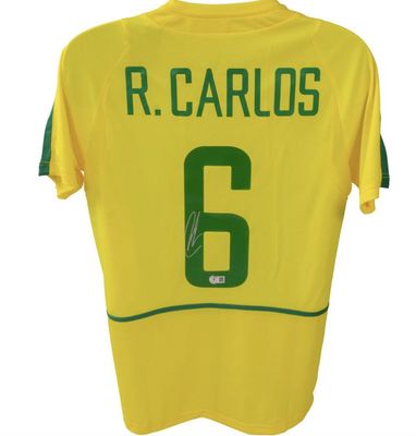 Trikot Roberto Carlos Nr. 6 Brasilien, signiertes WM-Trikot 2002, Brasilien 2002  Replika-Trikot Brasilien 2002, signiert von Roberto Carlos  Echtheitszertifikat: Beckett-Hologramm  Lieferzeit: 10–20 Tage. Nach Ihrer Bestellung erhalten Sie alle Deta