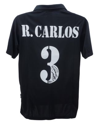 Maglia di Roberto Carlos numero 3 del Real Madrid 2002/2003 autografata. Maglia del Real Madrid 02/03 autografata da Roberto Carlos.  Replica della maglia del Real Madrid 2002/2003 autografata da ROBERTO CARLOS.  Autenticazione: Ologramma Beckett.  T