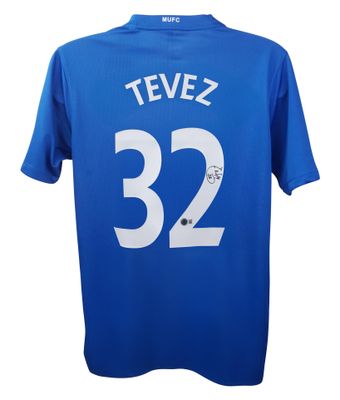 Maglia di Carlos Tevez numero 32 del Manchester United, stagione 2007-2008, autografata.  Replica della maglia del Manchester United, autografata da Carlos Tevez, stagione 2007-2008.  Autenticazione: BECKETT
