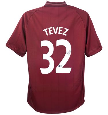 Manchester City Trikot Nr. 32 von Carlos Tevez (Saison 2012/13) mit Autogramm  Replika-Trikot von Manchester City, signiert von Carlos Tevez (Saison 2012/13)  Echtheitszertifikat: BECKETT  Lieferzeit: 10–20 Tage