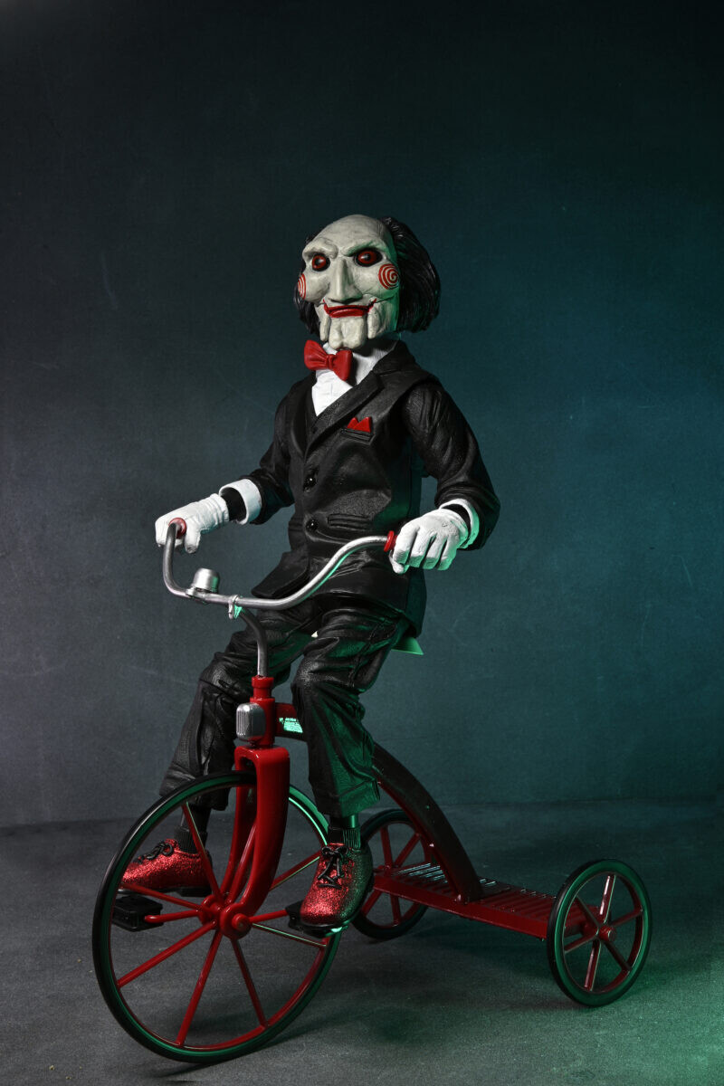 PRE ORDER** NECA 12″ Saw Billy Puppet on Tricycle Action Figure with Sound