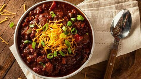 MEATLESS CHILI CON CARNE PIE & Cheddar Cheese (V) - A traditional Chili Con Carne combo heightened by the subtle addition of Cocoa and Guinness with absolutely no meat. MEATLESS CHILI CON CARNE PIE & Cheddar Cheese (V) - A traditional Chili Con Carne combo heightened by the subtle addition of Cocoa and Guinness with absolutely no meat.