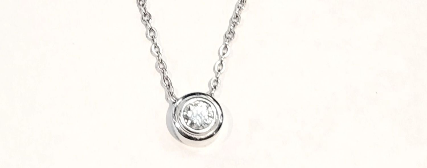 31-00472 14K GOLD DIAMOND PENDANT ON AN 18' LINK CHAIN .40 CT DIA