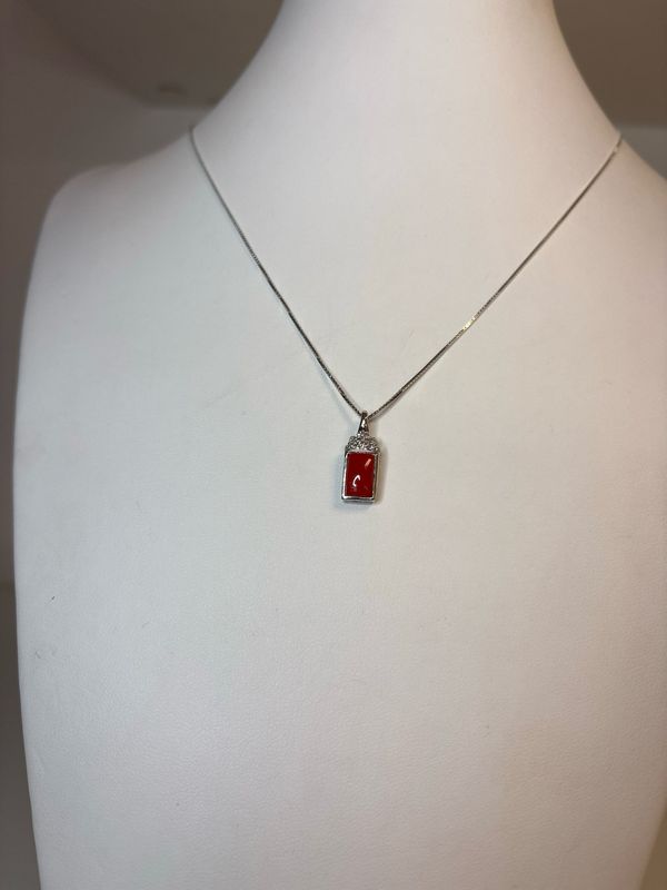 Collana in argento 925 con ciondolo in argento 925 zirconi e corallo mediterraneo.