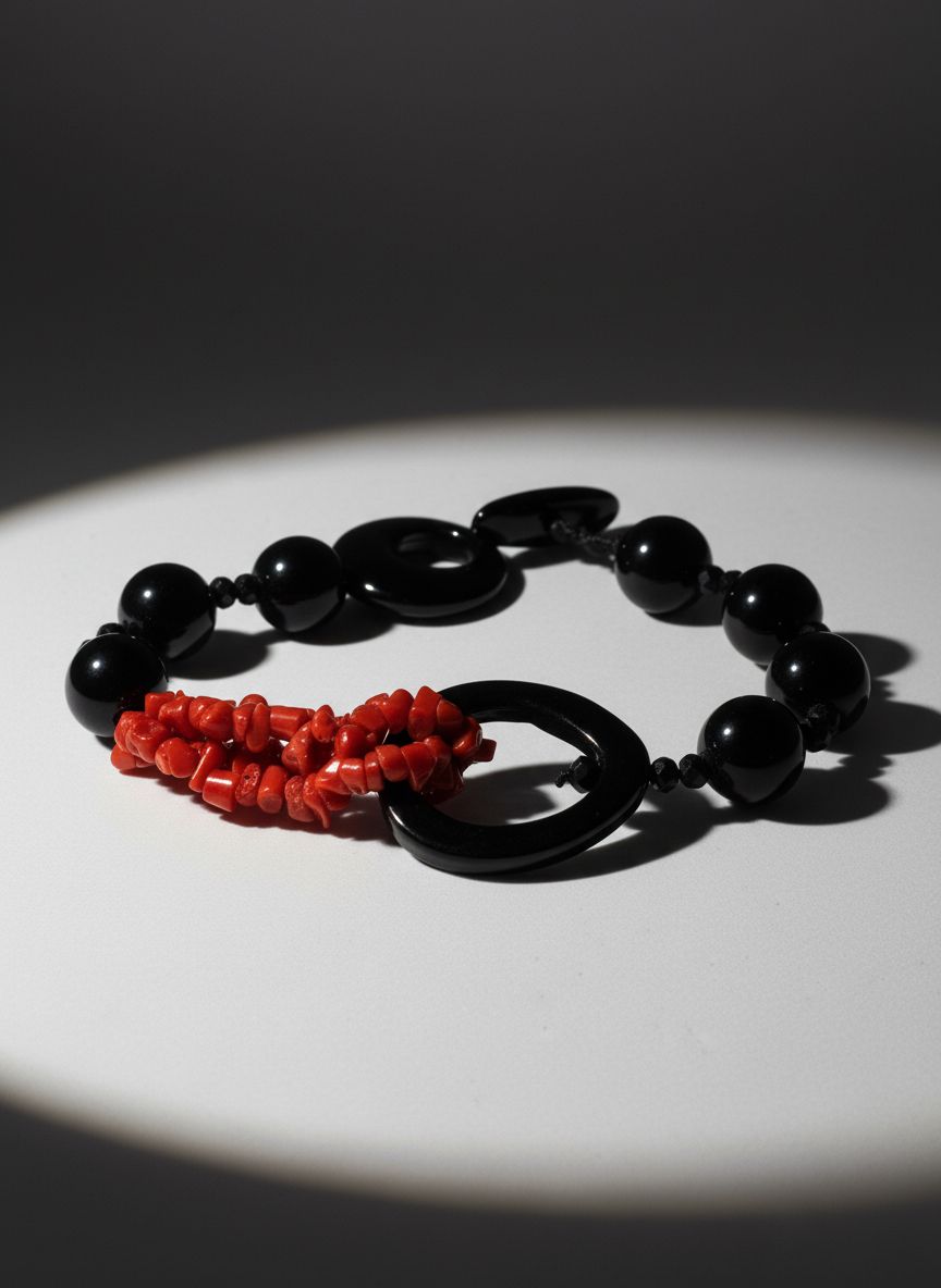 Bracciale con corallo mediterraneo e Agata nera liscia