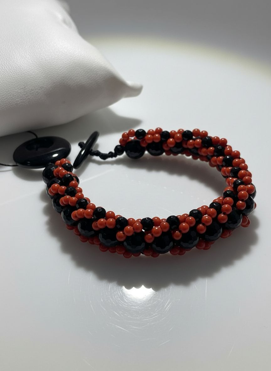 Bracciale in corallo mediterraneo e Agata nera sfaccettata