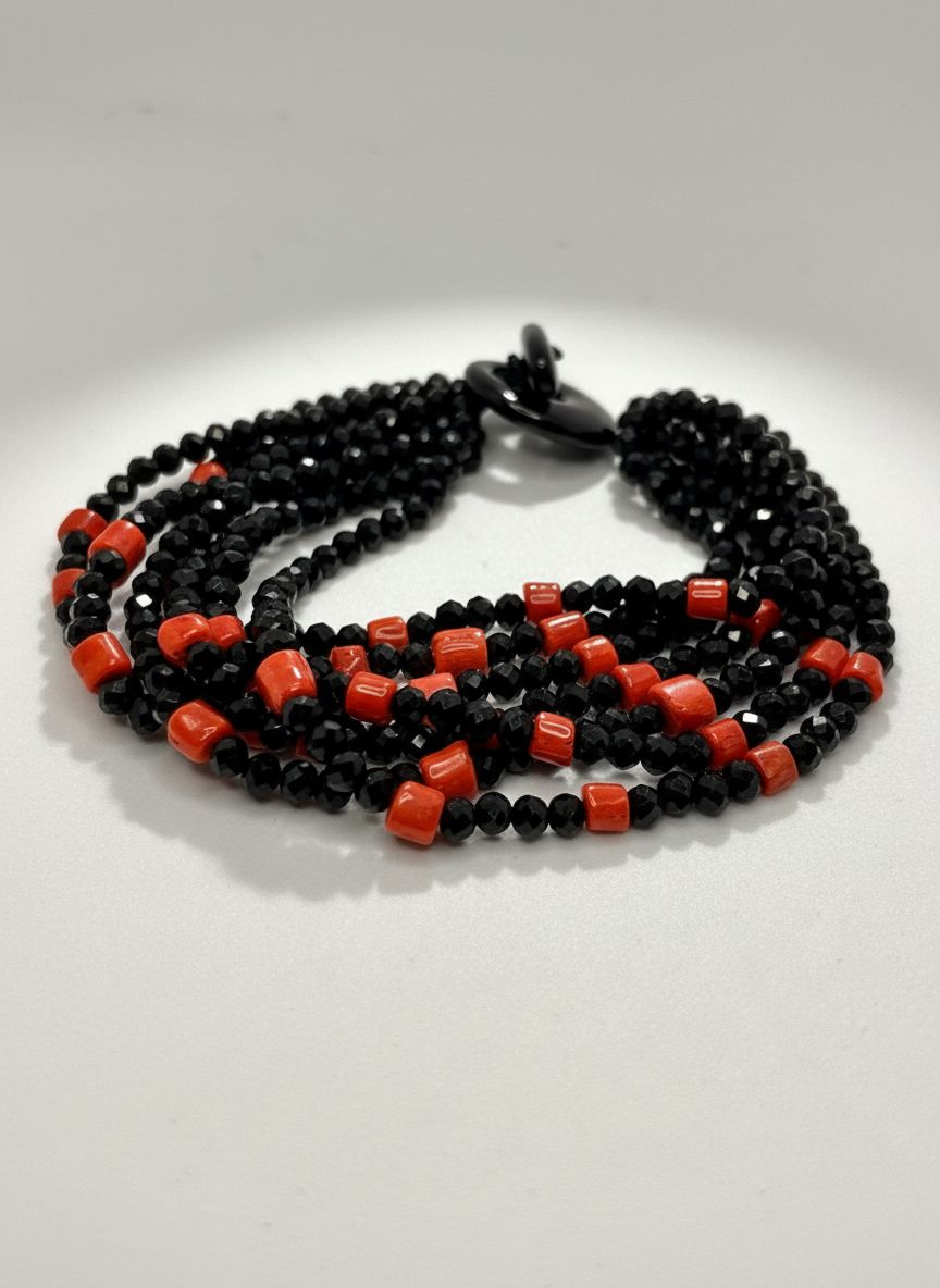 Bracciale in corallo mediterraneo e Agata nera sfaccettata