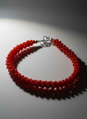 Bracciale in corallo mediterraneo in tessuto