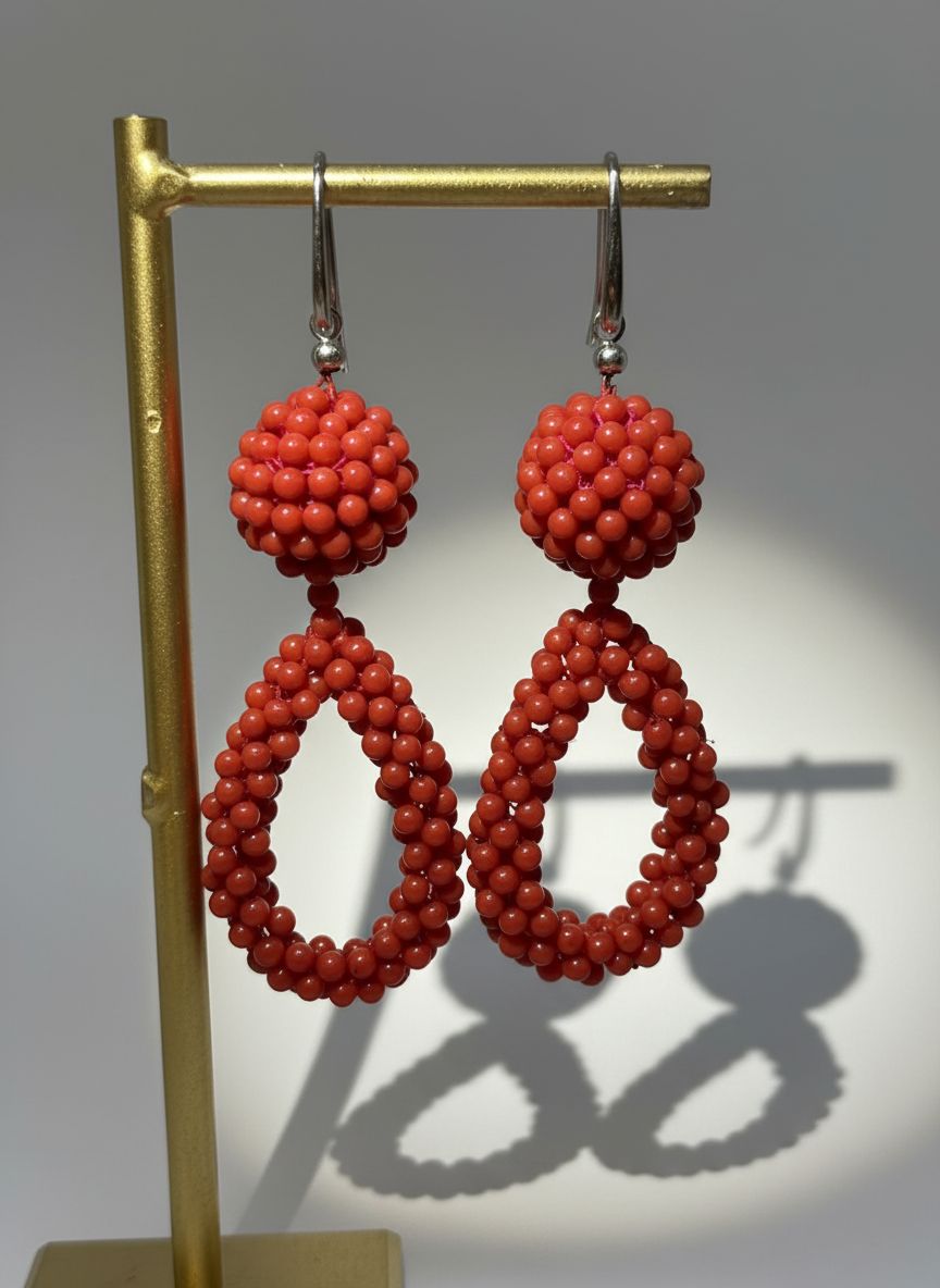 Orecchini in corallo mediterraneo, montati in argento 925 lavorazione a tessuto