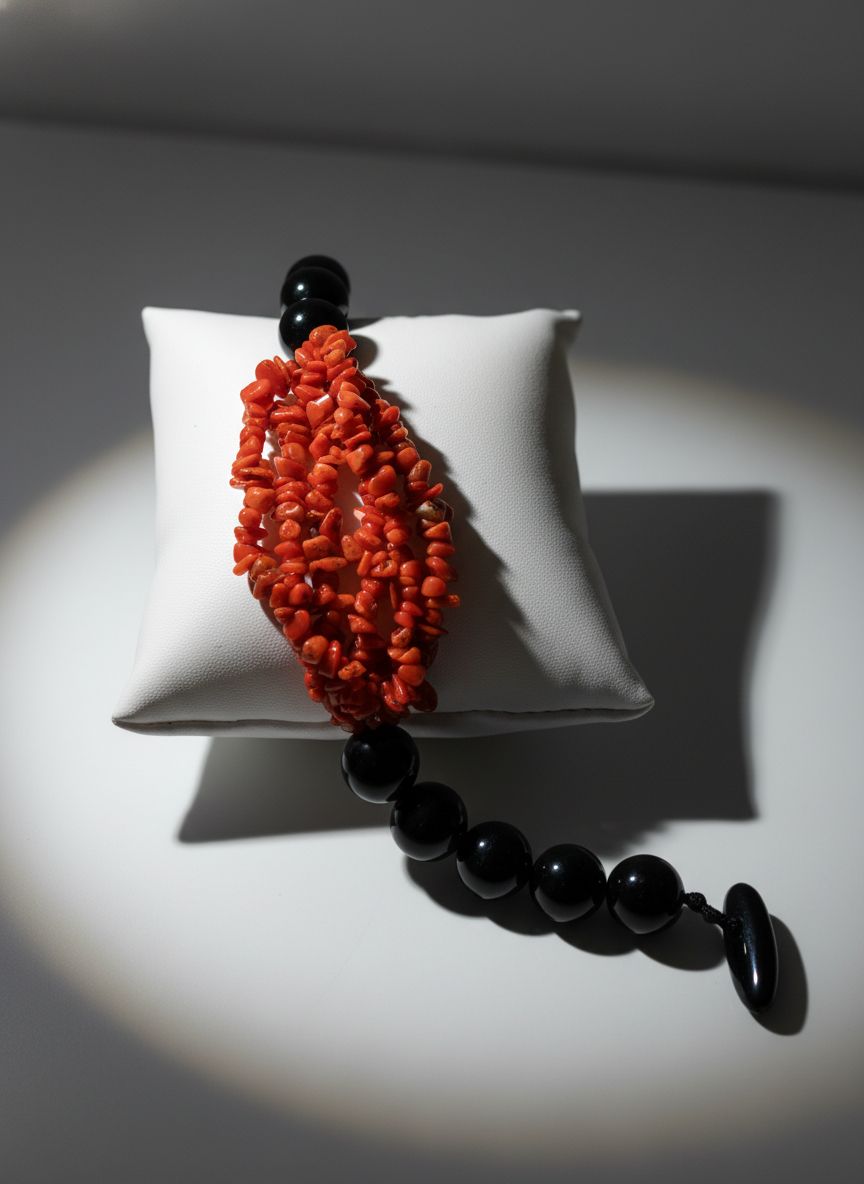 Bracciale in corallo mediterraneo e agata nera