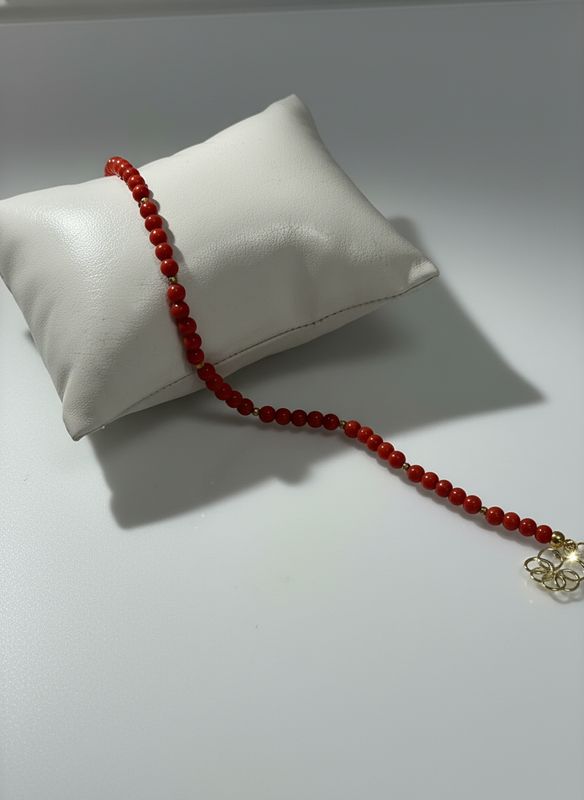 Bracciale in corallo montato in argento 925 placcato oro