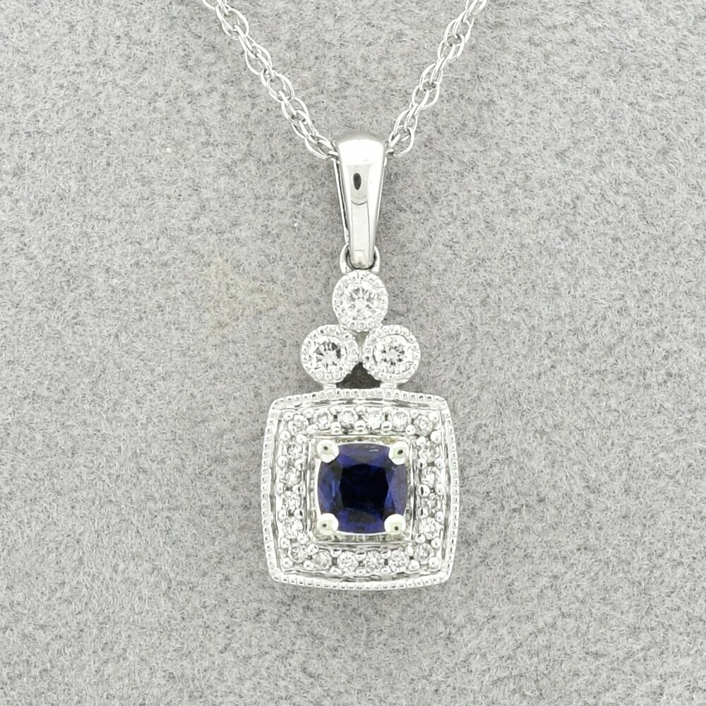 14KWG Sapphire and 0.20ct Diamond Pendant