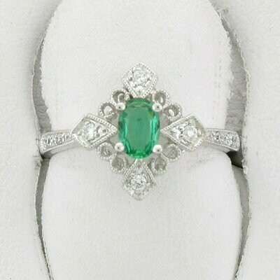 14KWG Emerald and 0.10ct Diamond Ring
