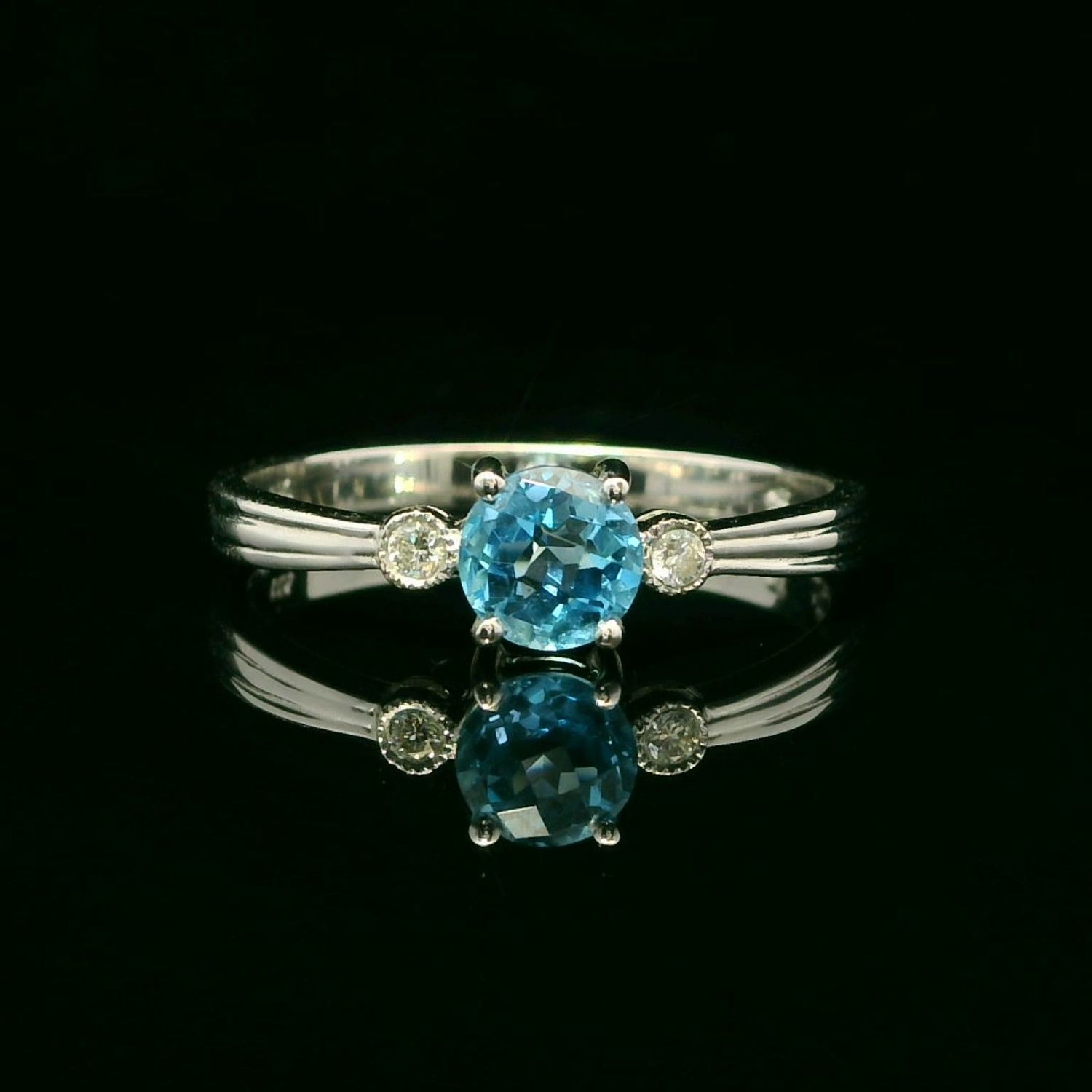14KWG Blue Topaz and Diamond Ring