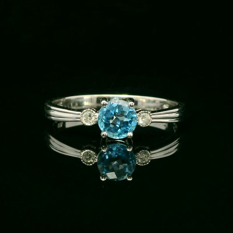 14KWG Blue Topaz and Diamond Ring