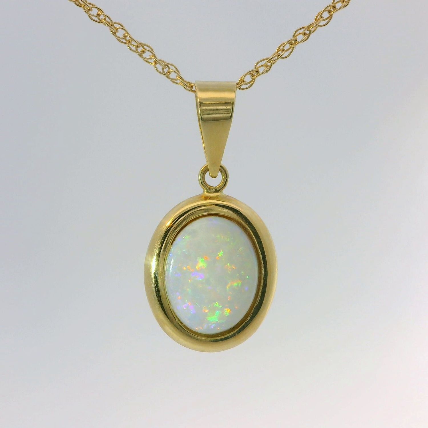14KYG White Opal Pendant