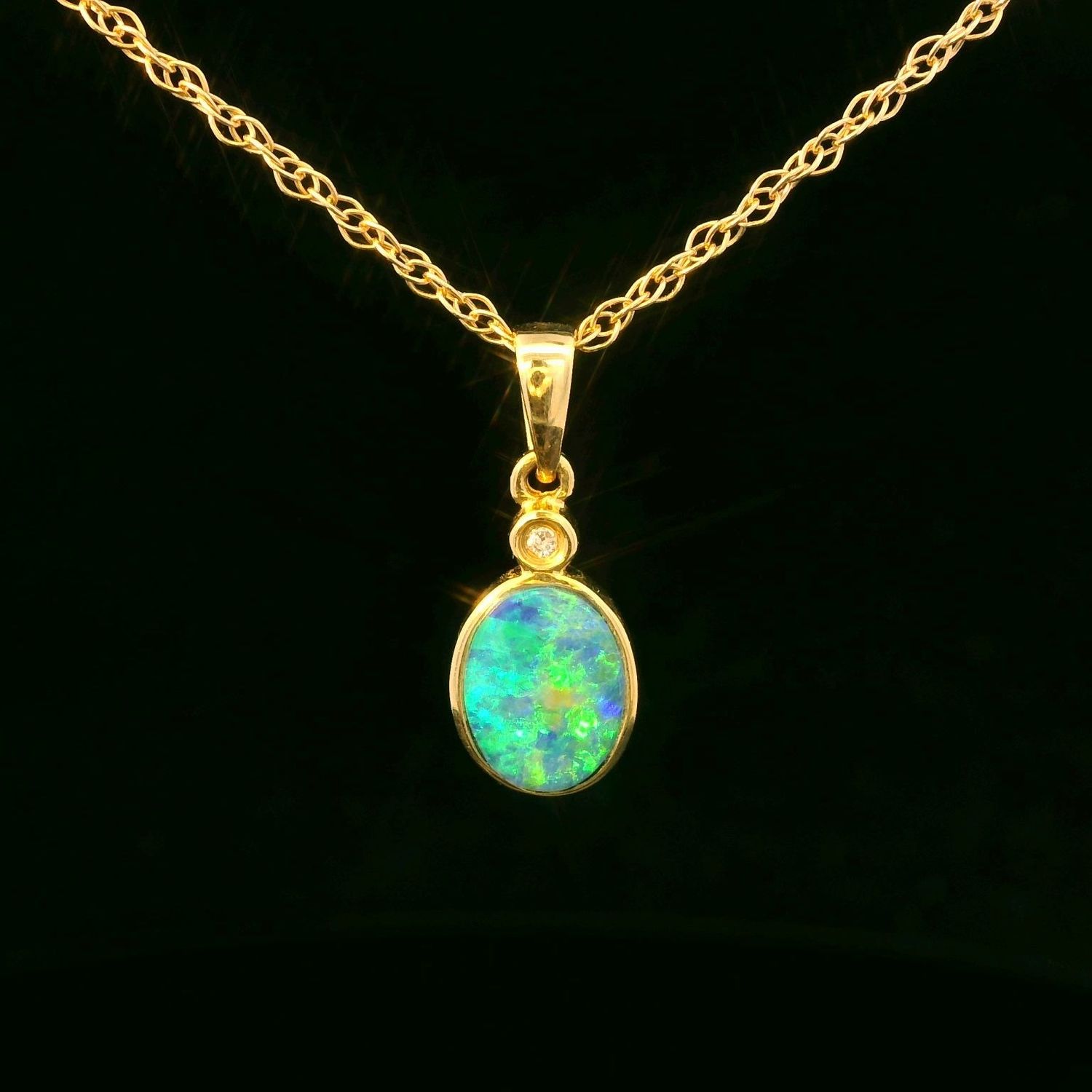 14KYG Oval Boulder Opal and Diamond Pendant