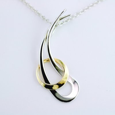 14K Yellow Gold and Sterling Silver Trapped Circle Pendant