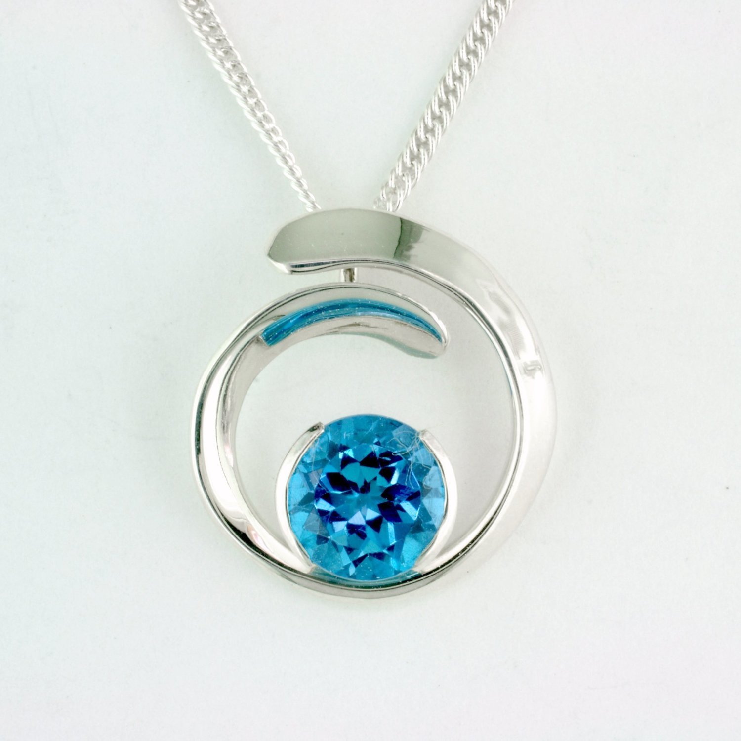 Sterling Silver Blue Topaz Overlap Curl Pendant