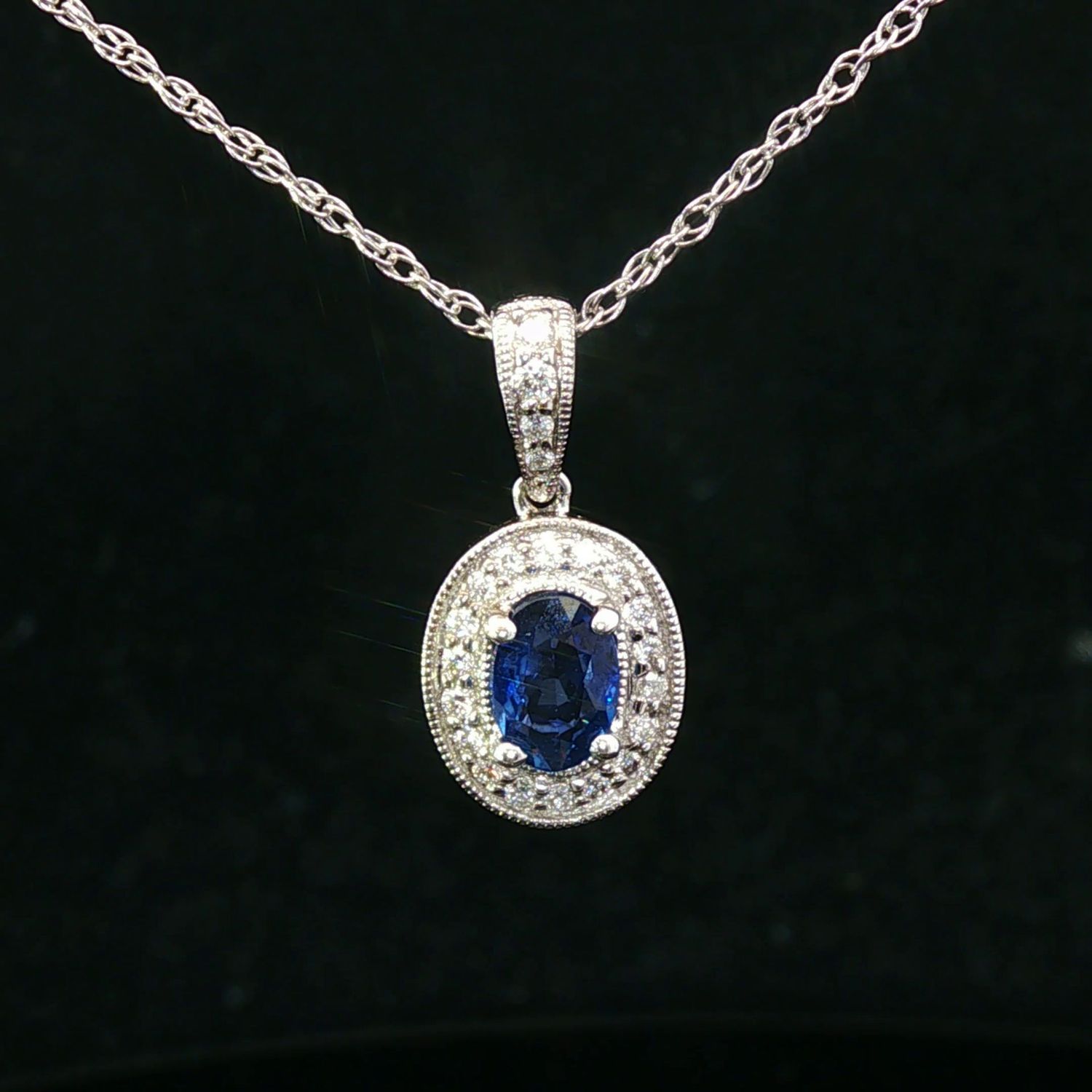 14K White Gold Oval Sapphire and Diamond Halo Pendant