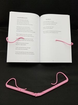 Pink book holder