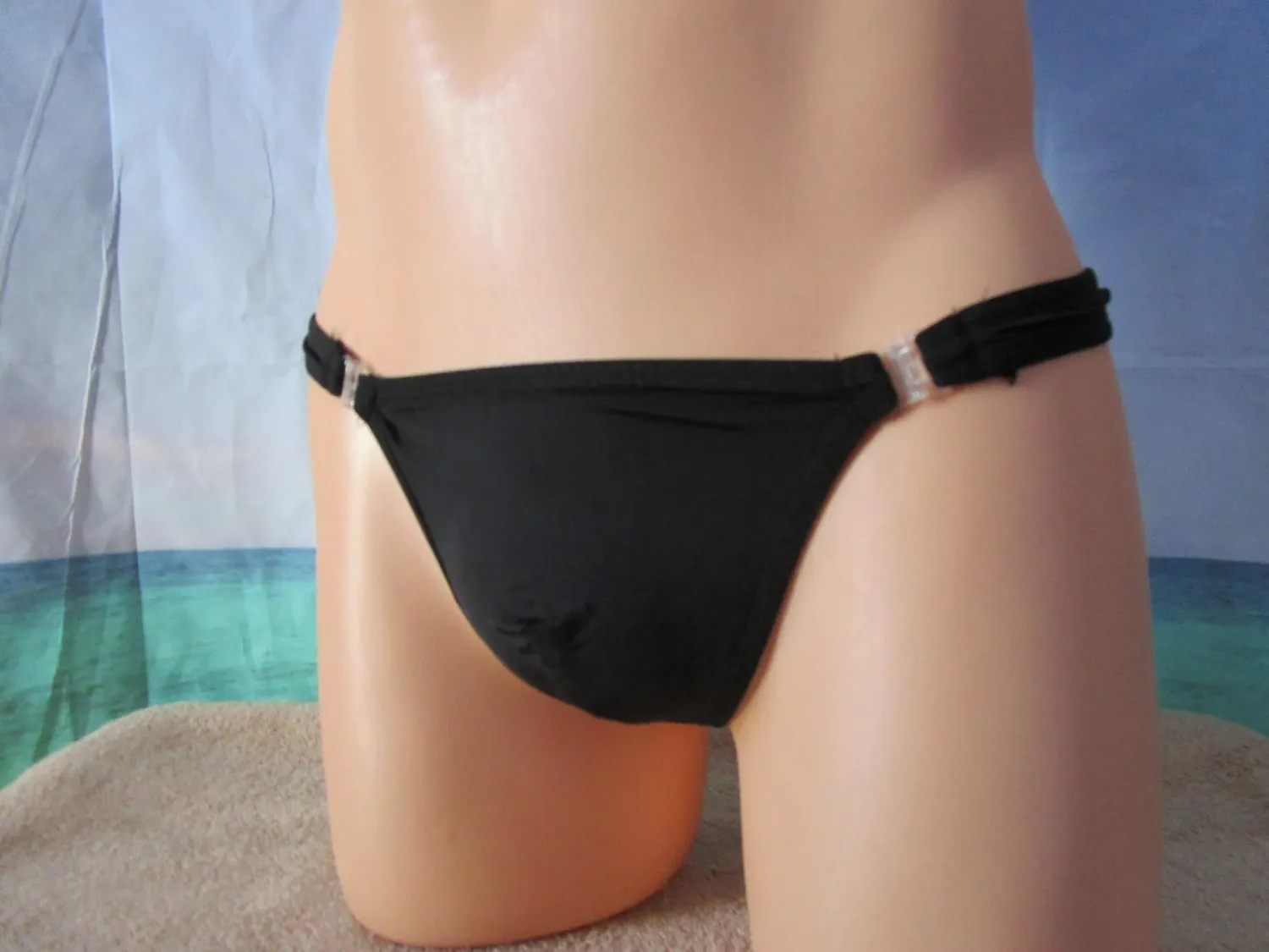 4 Spandex Thongs. 1 of each colors in a Men&#39;s Size 36-39&quot;