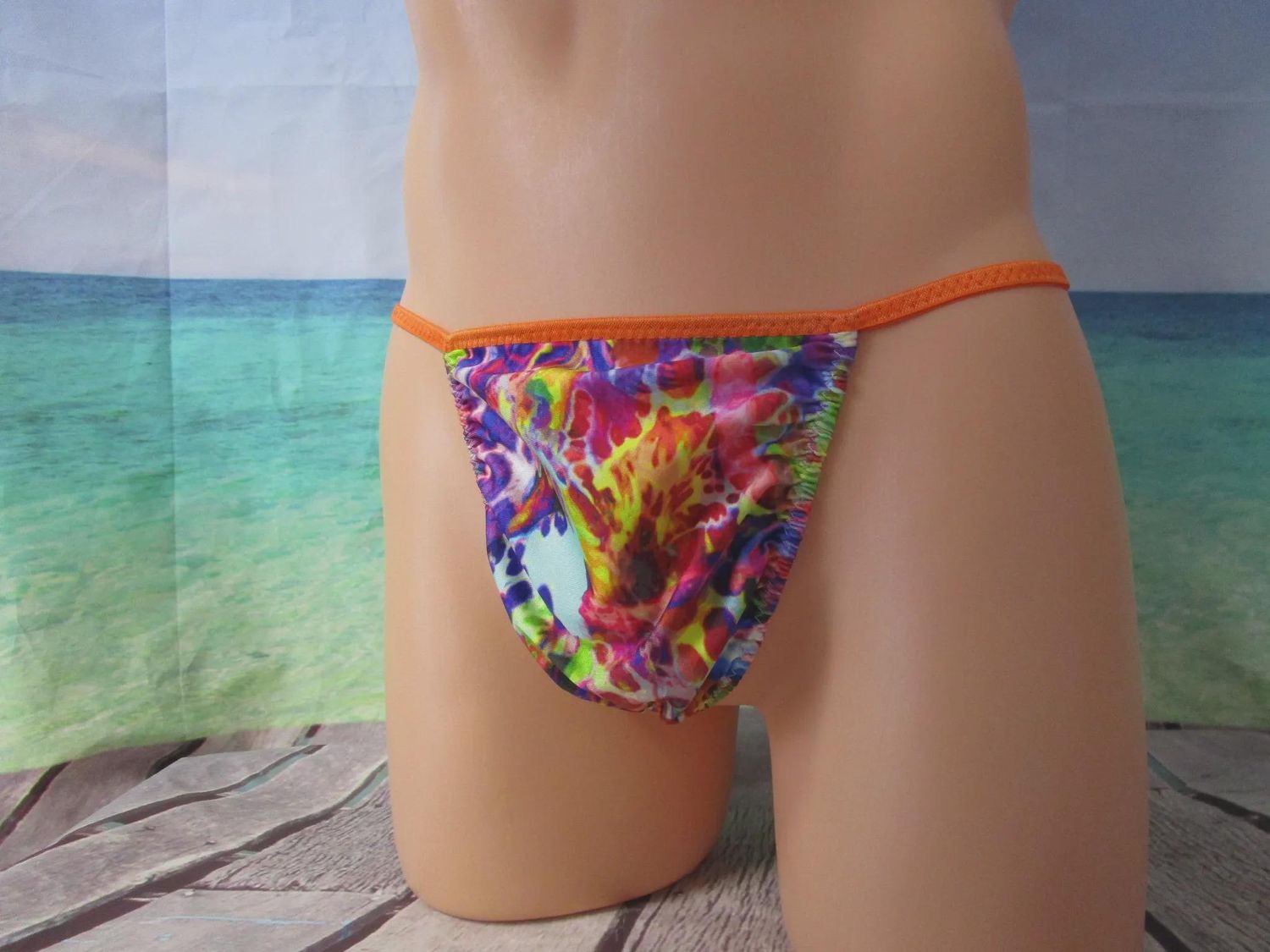 Rainbow Splatter Nylon Spandex Knit G-String, Medium Man Front - Size M 36-39&quot;